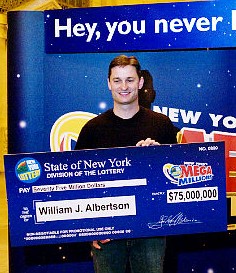 Mega Millionaire William Albertson shows off his $75M check at Grand Central Terminal.
