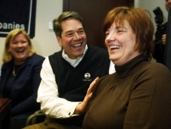 Anne LaFontaine of Summit laughs along with Todd Ellis and fellow winner Joanne Roth during the press conference. Winners of the Lottery Mega Millions all work at Chubb Commercial Insurance IT department in Whitehouse Station during a press conference.