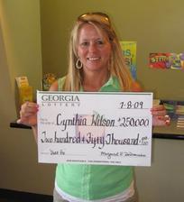 Cynthia Wilson, 47, of Chattanooga, TN, won $250,000 playing the Bass Pro Shops $250,000 Cash Adventure while in Ringgold for work.
